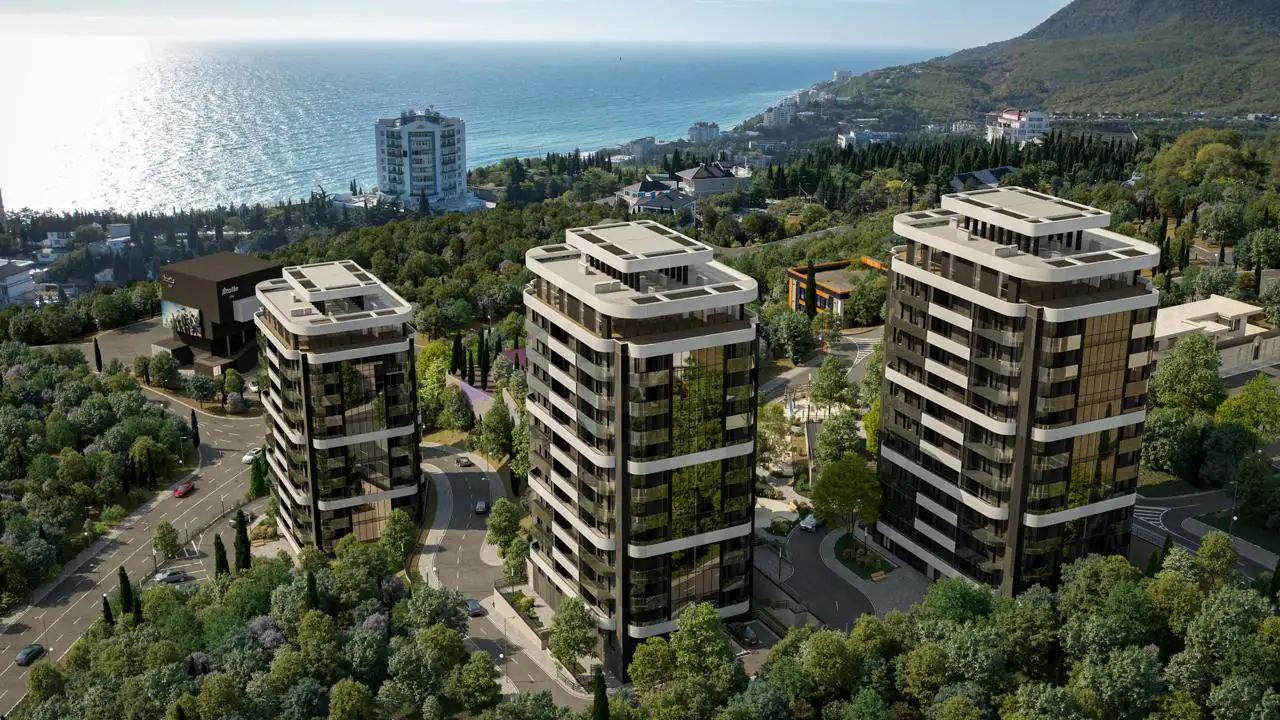 Общий вид на все корпуса ЖК ALEA и море на горизонте
